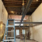 Interior steel beams supporting a shell, DC